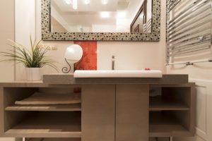 Powder Room showing sink, mirror and towel rack